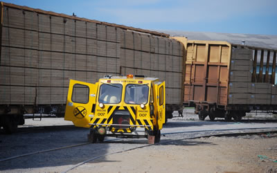 007 passes freight cars