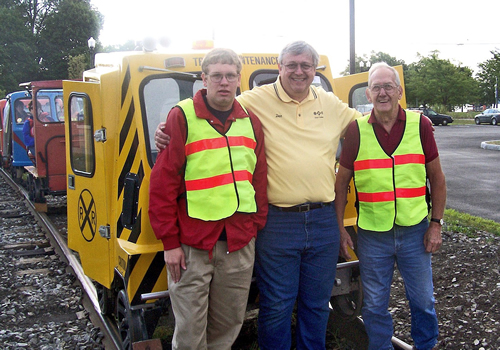 Chris, Dan, and Harvey beside Railcar 007 at Finger Lakes Railway, 2008